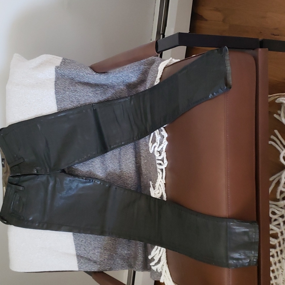 COPY - AG Black with a tint of green coated jeans